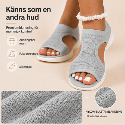 Bekväma, andningsbara platta sandaler