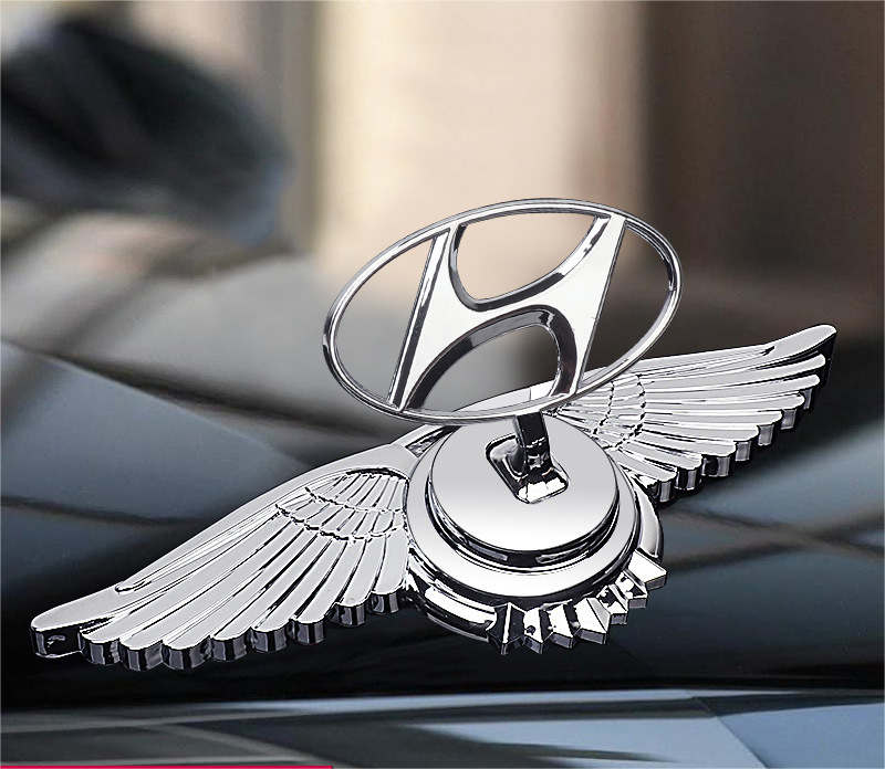 Motorhuvsemblem med billogo