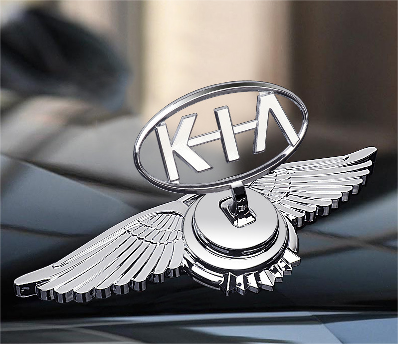 Motorhuvsemblem med billogo