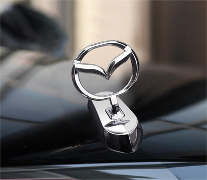 Motorhuvsemblem med billogo