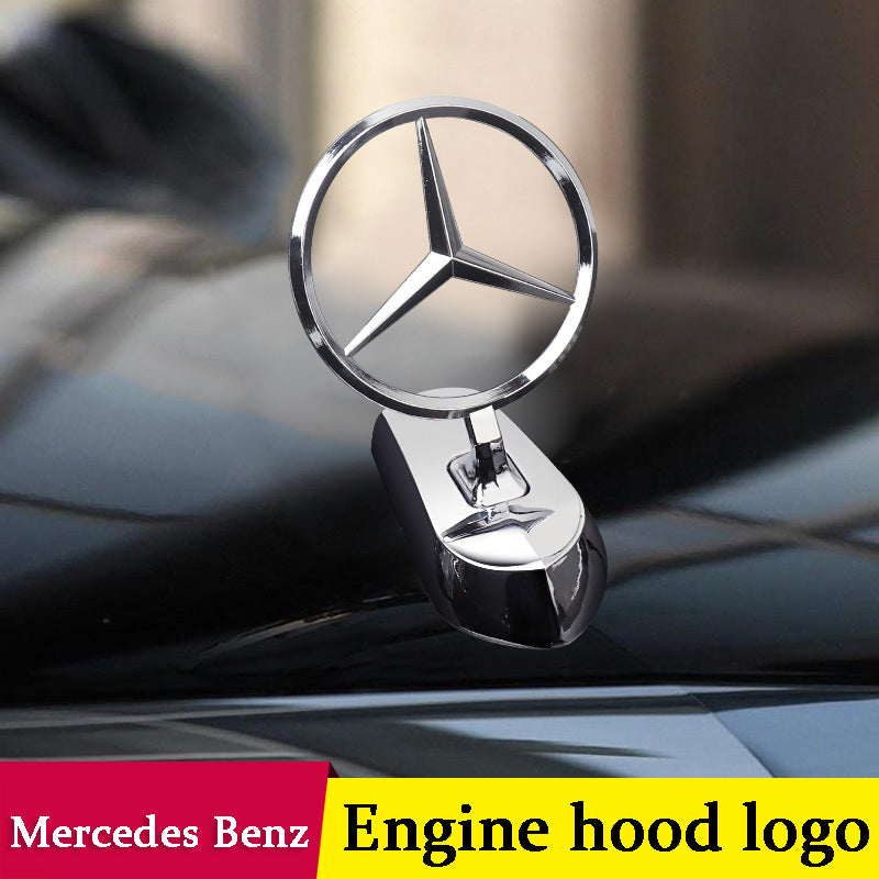 Motorhuvsemblem med billogo