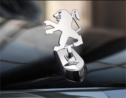 Motorhuvsemblem med billogo