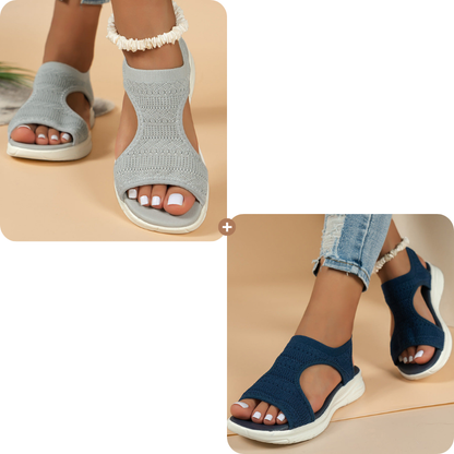 Bekväma, andningsbara platta sandaler